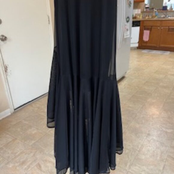 Black formal girls dress with multiple layers of sheer ruffles at the bottom. - Picture 6 of 7